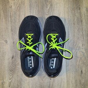 Black size 16 men's New Balance sneakers